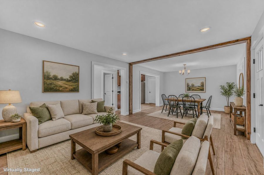 Living and dining rooms. Virtually staged.
