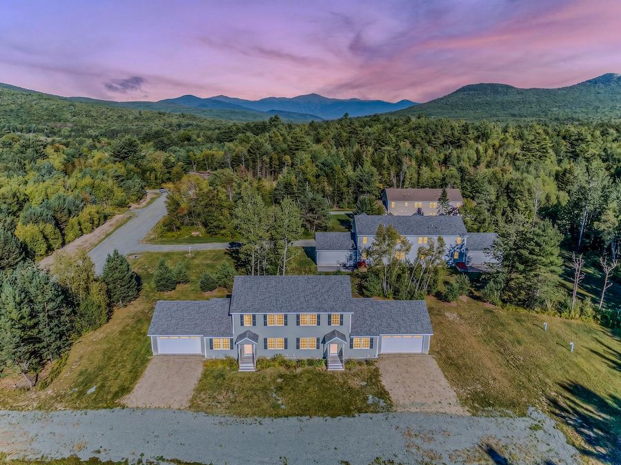 Aerial at dusk, Presidential Range beyond. Twilight sky digitally enhanced.