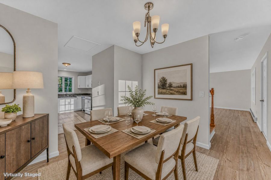 Dining area. Virtually staged.